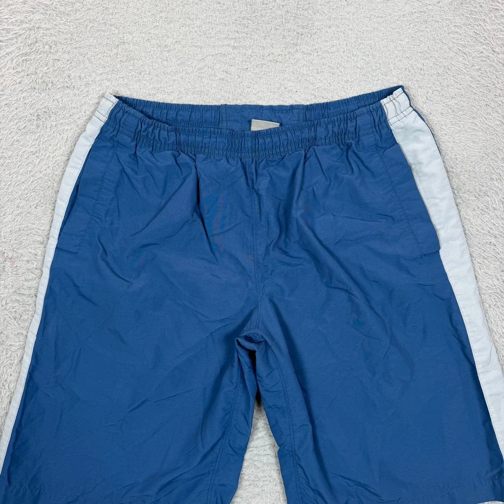 Vintage Nike Boys Blue Nylon Athletic Shorts White Side Stripe Logo Size Medium